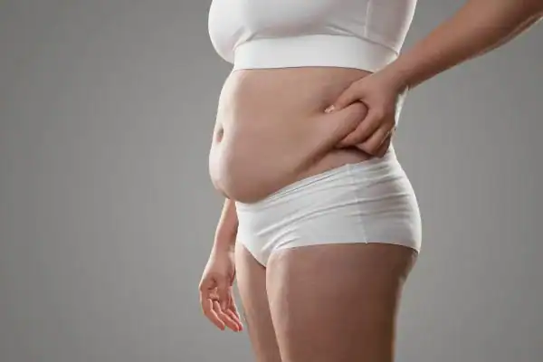 The Hidden Connection: How Stress Shapes Your Fitness and Body Composition 1 Image of stress belly Eastbourne How Lipo 360 can help manage your symptoms