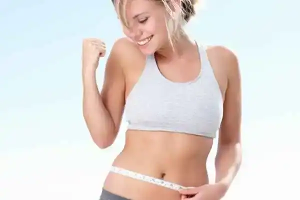 Unraveling the Mystery: Where Does the Body Fat Loss From First? 3 Image of woman happy with fat loss Eastbourne